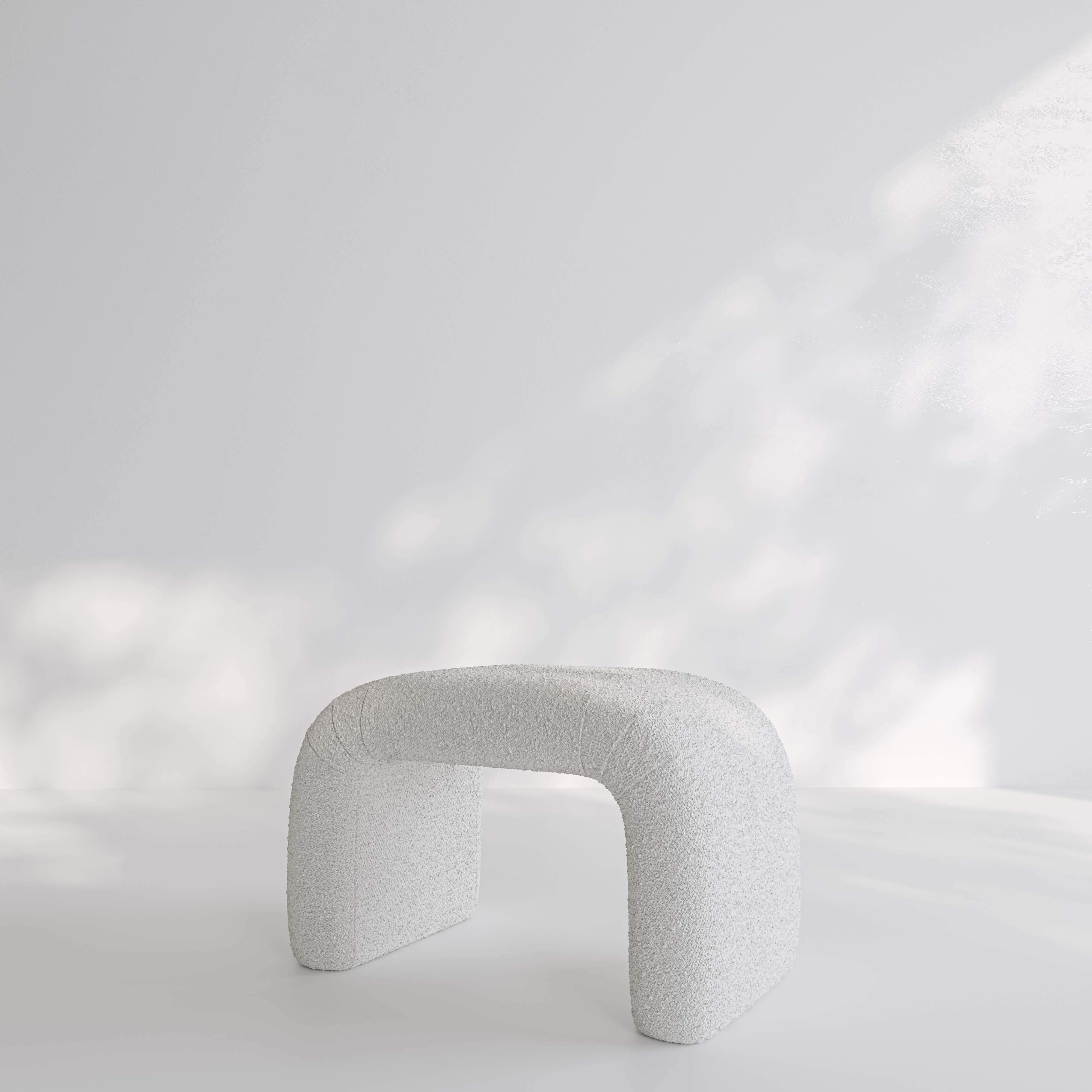 The Amalfi Arch Boucle Pouf Ottoman
