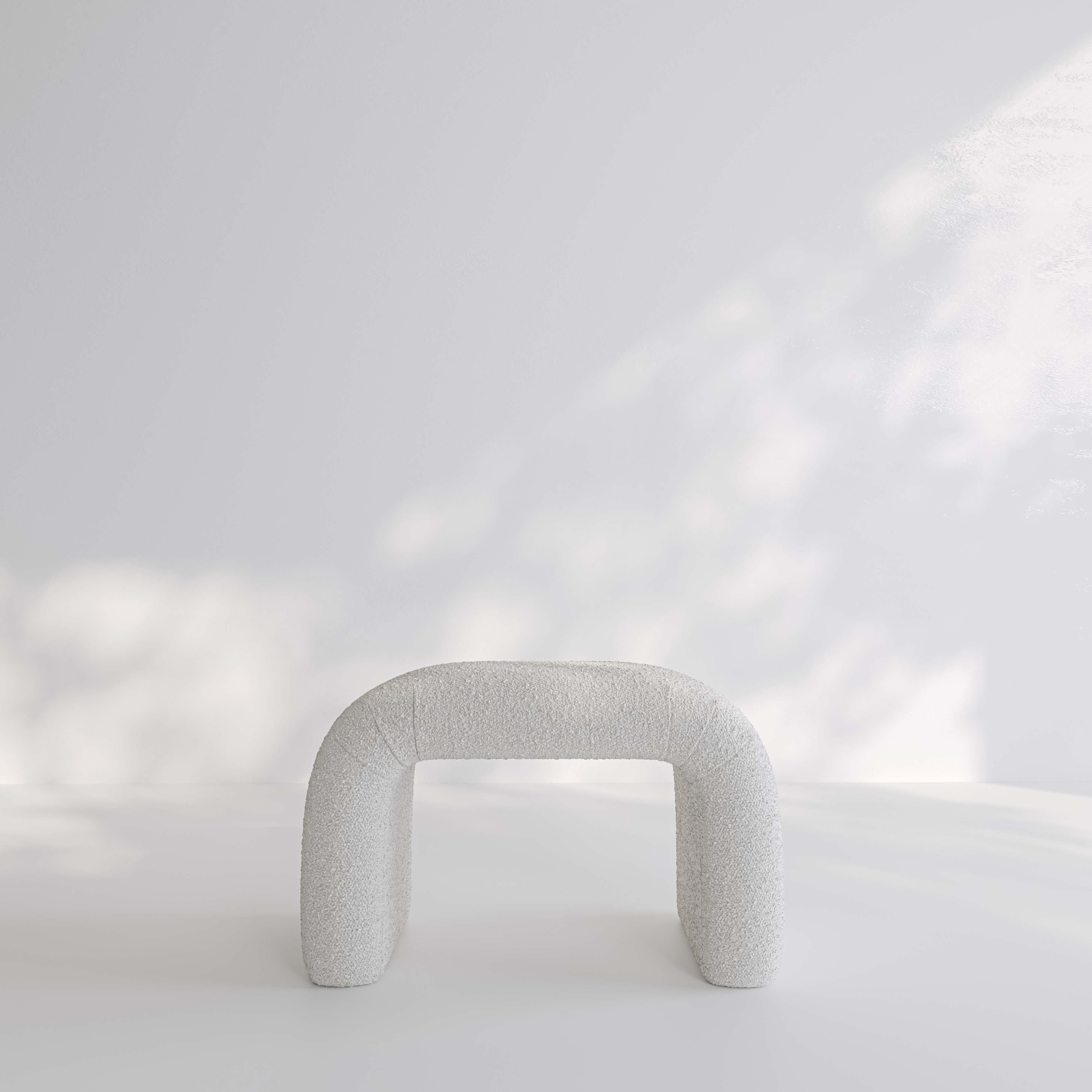 The Amalfi Arch Boucle Pouf Ottoman
