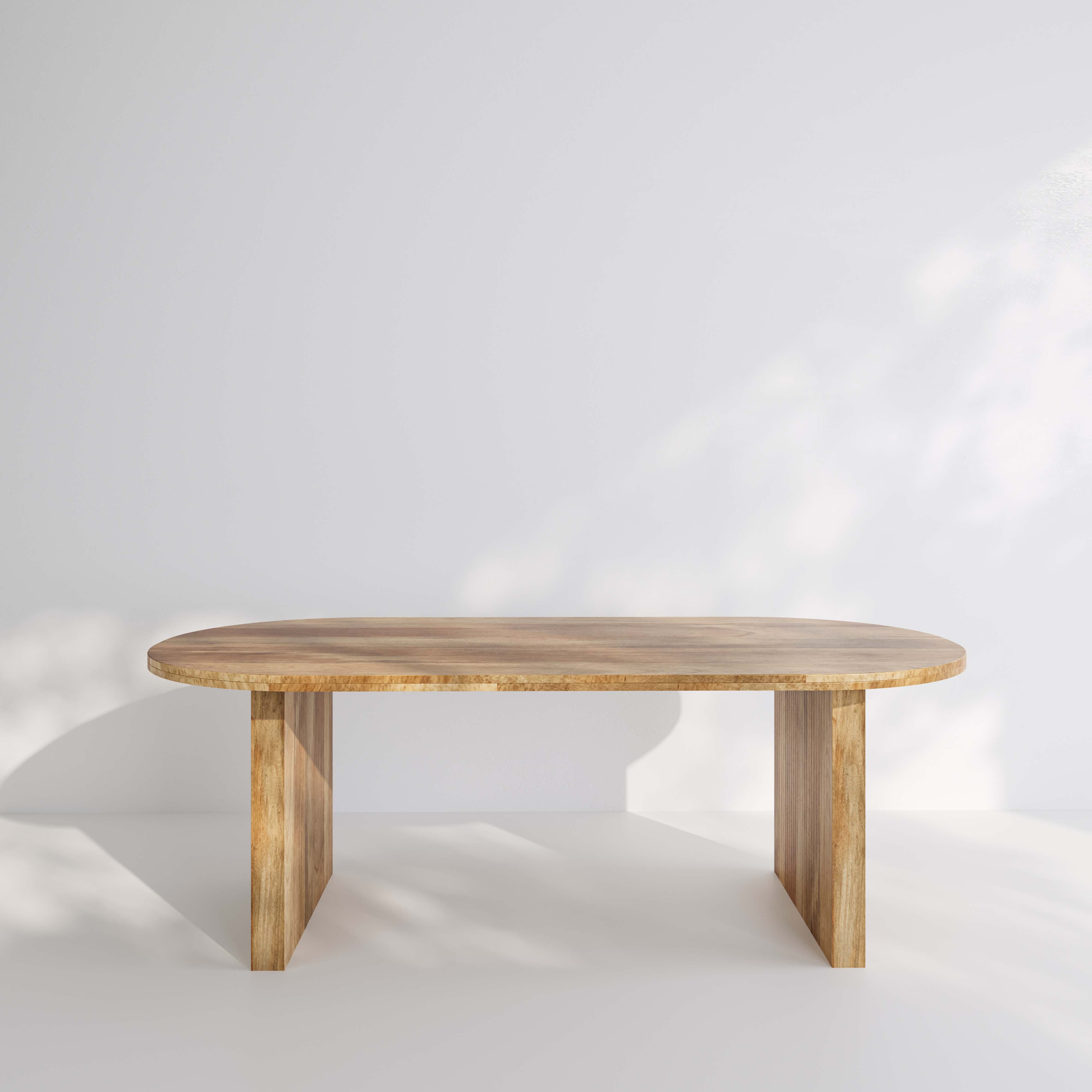 The Avalon Oval Dining Table